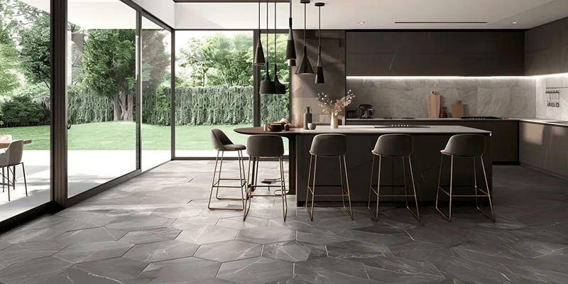 Hexagonal ceramic tiles create a stylish honeycomb pattern, adding geometric charm and timeless elegance to any kitchen floor