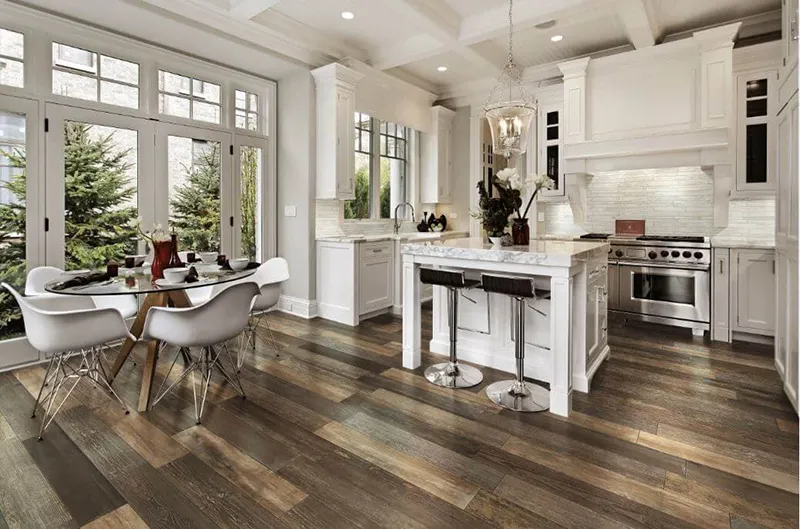 The running bond pattern mimics natural wood floors, offering a stylish, durable, and easy-to-maintain layout for kitchen ceramic tiles