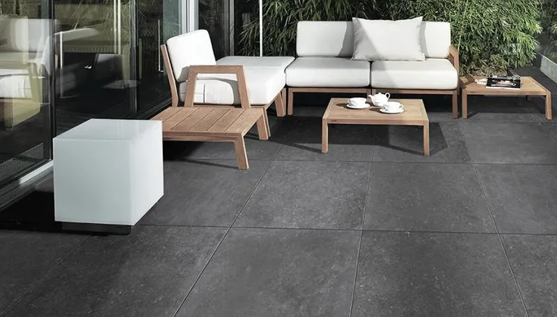 Concrete-look ceramic tiles for the yard